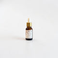 Your Everyday Cuticle Oil — Rosé Berry Fizz  — raspberry, prosecco, and soft berries photographed in an amber glass nail‑care bottle on a clean white background.