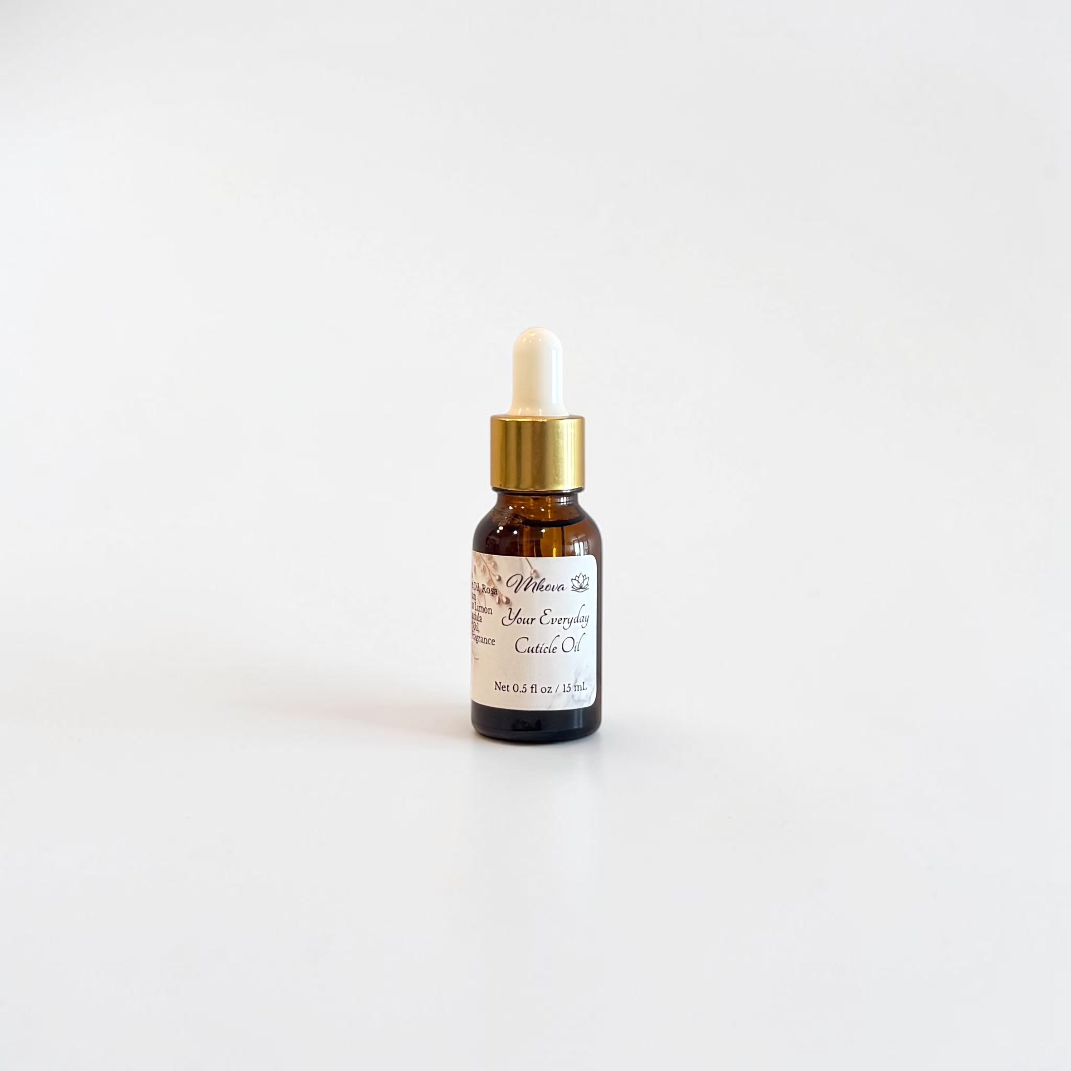 Your Everyday Cuticle Oil — Rosé Berry Fizz  — raspberry, prosecco, and soft berries photographed in an amber glass nail‑care bottle on a clean white background.