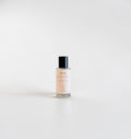Rosemilk & Santal Fine Fragrance Mist — soft milky rose and warm santal perfume mist photographed on a clean white background.