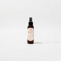 Sugared Sun Body Oil — whipped mallow, amber suede, and coconut silk photographed on a clean white background.