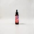Sunkissed Tahiti Body Oil — lily, jasmine, warm sugar, amber, musk, and creamy vanilla photographed on a clean white background.