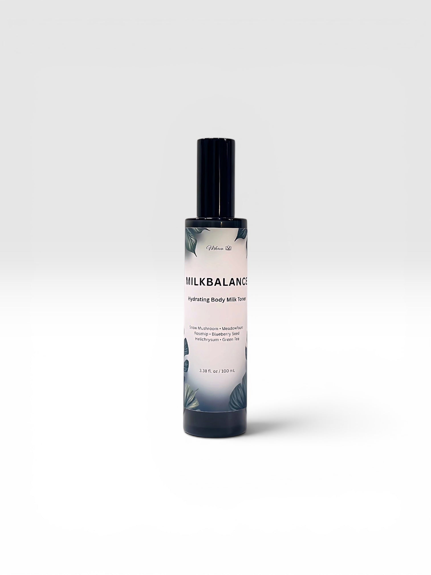 MilkBalance Body Toner — snow mushroom, meadowfoam, jojoba, and rosehip oils photographed in a milky glass bottle on a clean white background.